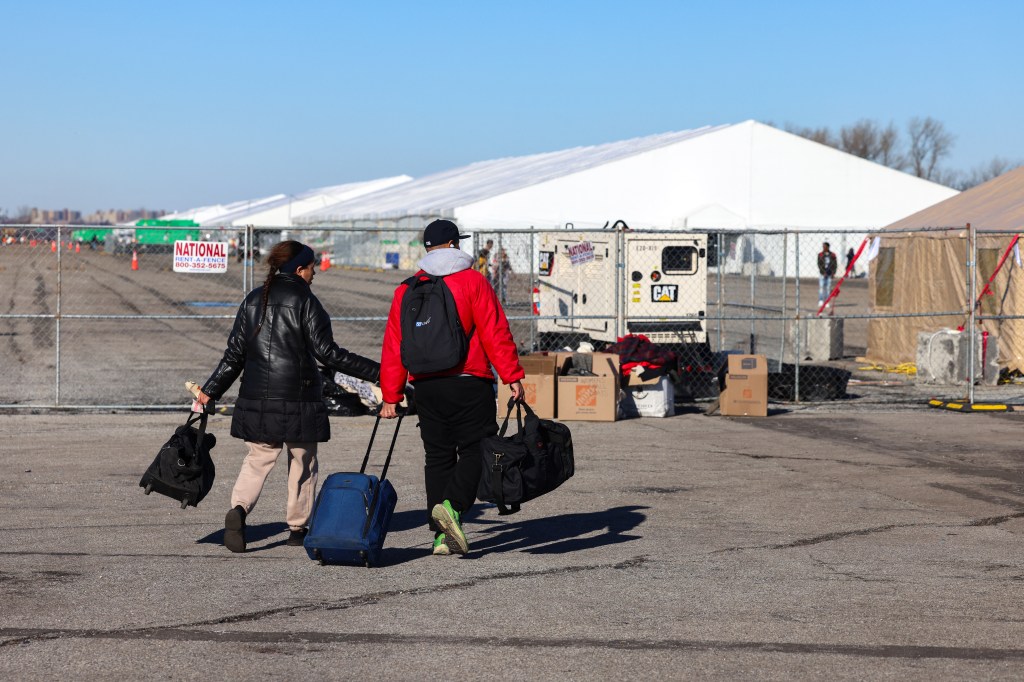 Migrants arriving at the shelter Floyd Bennett Field in Brooklyn on Feb. 3, 2024.