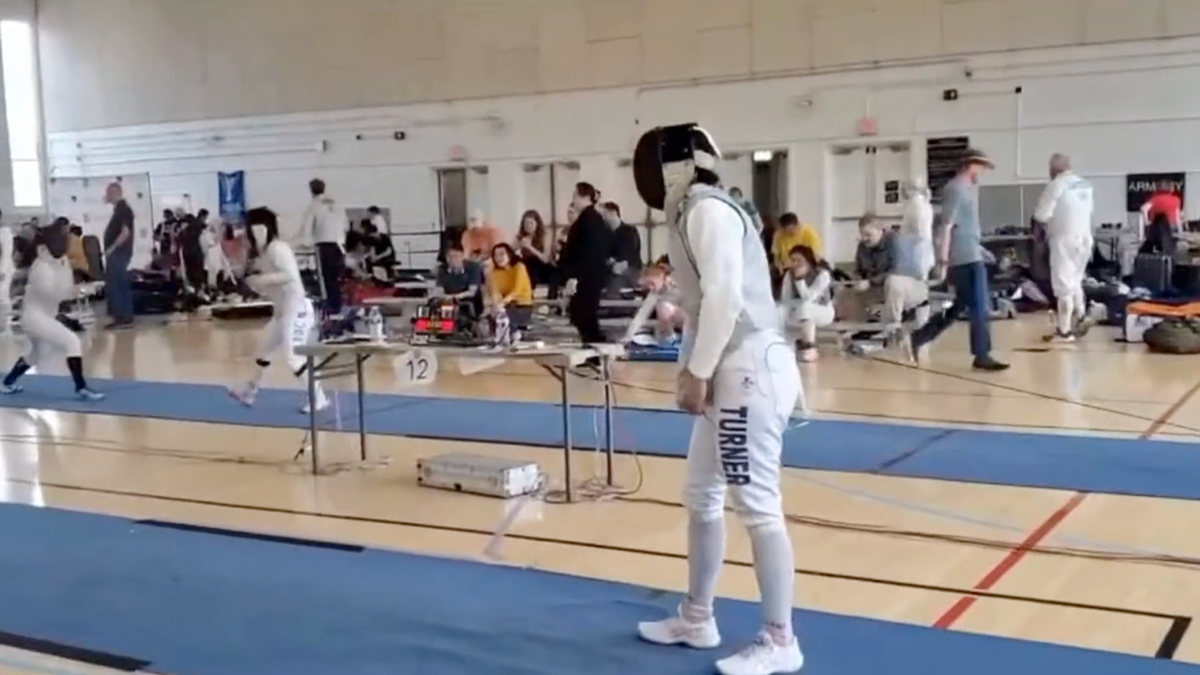 Stephanie Sullivan gets ready to kneel