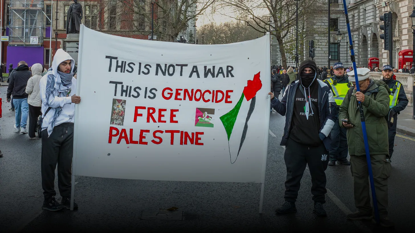 Protesters shouting Genocide